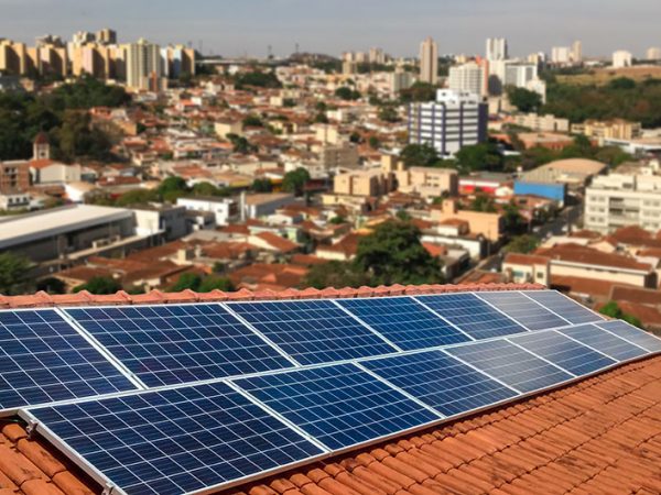 Brazil city with solar panels in foreground